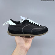 Miu Miu Tyre Low-Top Sneakers in Black or White