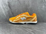 New Balance 204L Yellow and Brown Sneakers